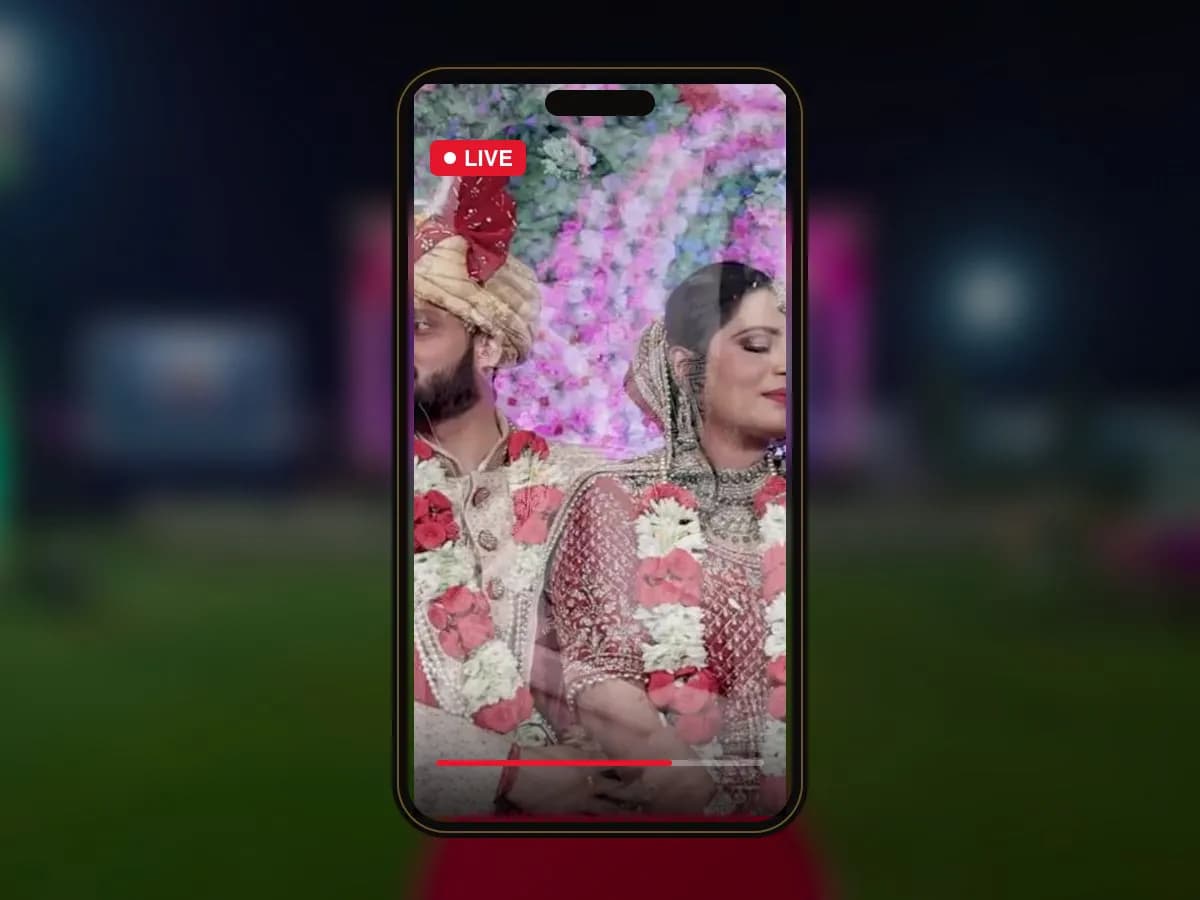 Wedding couple on stage shown on a live stream